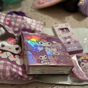 Sanrio 4 piece bundle. Comes with pen set,‎ blind box, gift bag and coin purse